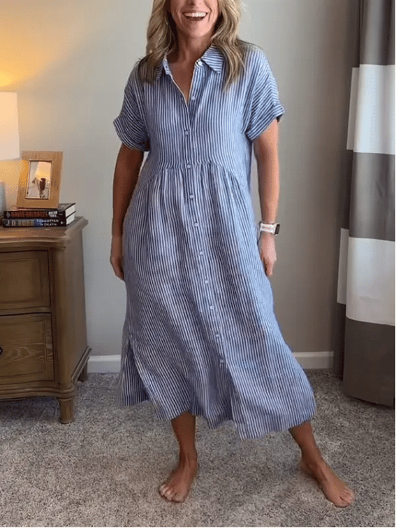 New button-up dress with striped flaps at the bottom | With functional pockets